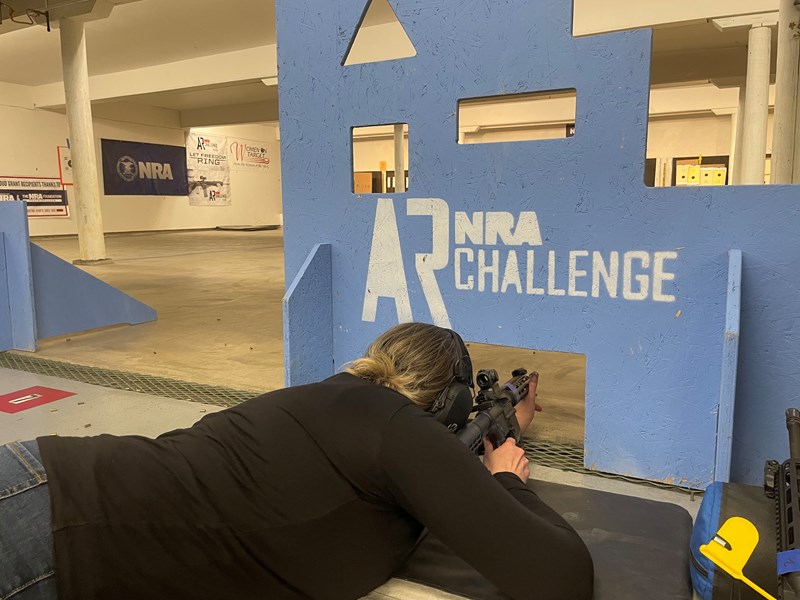 woman target practicing