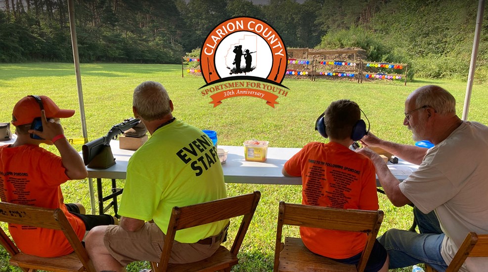 Adults teaching youth firearm safety