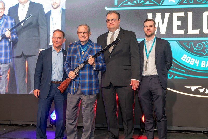 Henry Repeating Arms giving veteran a firearm at the NRA Foundation Banquet and Auction